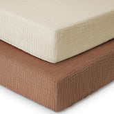 Yoofoss muslin crib sheet on mattress offers breathable, skin-friendly comfort.
