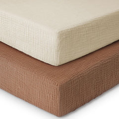 Yoofoss muslin crib sheet on mattress offers breathable, skin-friendly comfort.