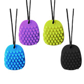 YQZIYOU chew necklace worn by child for sensory support and focus.
