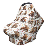 YUGUSNCH Highland Cow car seat cover in breathable, soft fabric for newborn privacy.