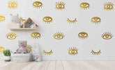 YUHASIDE 44pcs eye-pattern sticker gold pack enhances a playful girl’s bedroom wall decor.