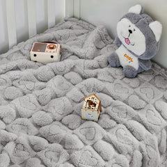 Decor-friendly design complements nursery with heart pattern.