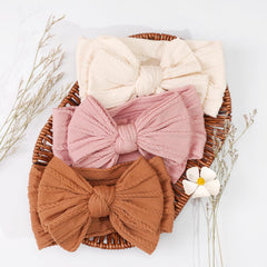 Yxiang newborn headband in soft nylon for gentle comfort.