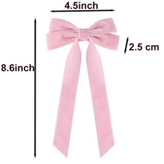 YYaaloa bowknot hair accessory closeup highlights soft velvet fabric.