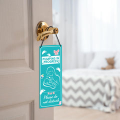Zaamwoyy breastfeeding door hanger sign back demonstrates double-sided visibility for shared spaces
