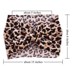 ZCYYYS Leopard Headband worn by a baby offers versatile fashion for daily outfits