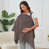 Zdolmy muslin nursing cover in coffee folded for travel.