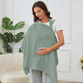 Zdolmy Muslin Nursing Cover in light cyan folded for compact packing and privacy