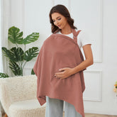 Zdolmy nursing cover worn by mom shows privacy-friendly breastfeeding on the go.