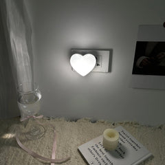 ZEZHOU heart wall-plug night light offers a gentle glow for kids' rooms.