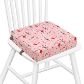Zicac portable toddler booster seat in pink provides cushioned, stable seating for family meals.