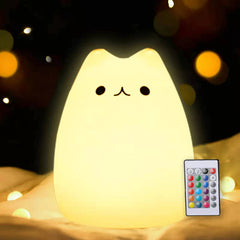 ZKLiLi cute remote cat night light on desk provides a warm bedtime glow.
