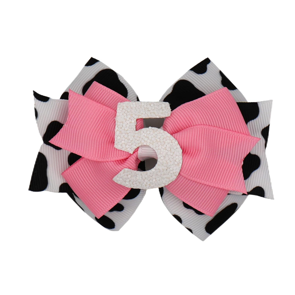 Zlwse birthday hair bow cow print front view, ideal for birthday outfits and photos.