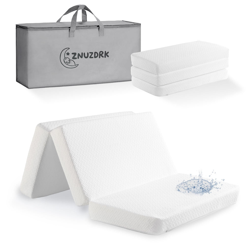 ZNUZDRK Pack and Play Mattress 38x26 folded for travel in a compact portable bag