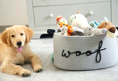 ZOMBATI Woof Dog Basket side view with sturdy handles for easy carrying.