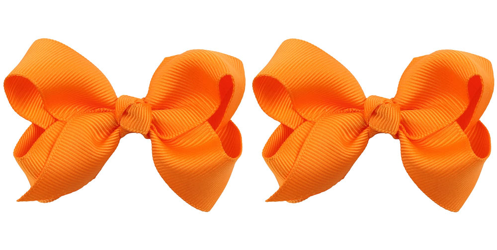 ZOONAI orange 3-inch bow clip adds a cute touch to baby photos.