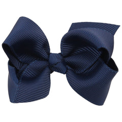 ZOONAI navy hair clip styled on a baby girl's hair for everyday chic.