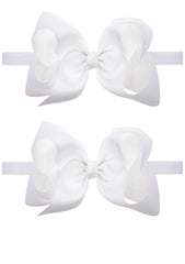 ZOONAI baby hair bow headband close-up showing soft elastic for comfortable wear.