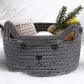 Zopeal cat basket front view with ears, decorative toy storage.