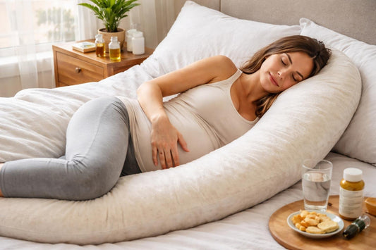 Pregnant woman using support pillow for comfort