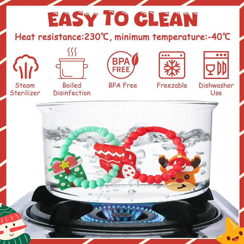 2ooya teether with rattles Christmas edition engages baby during sensory play.