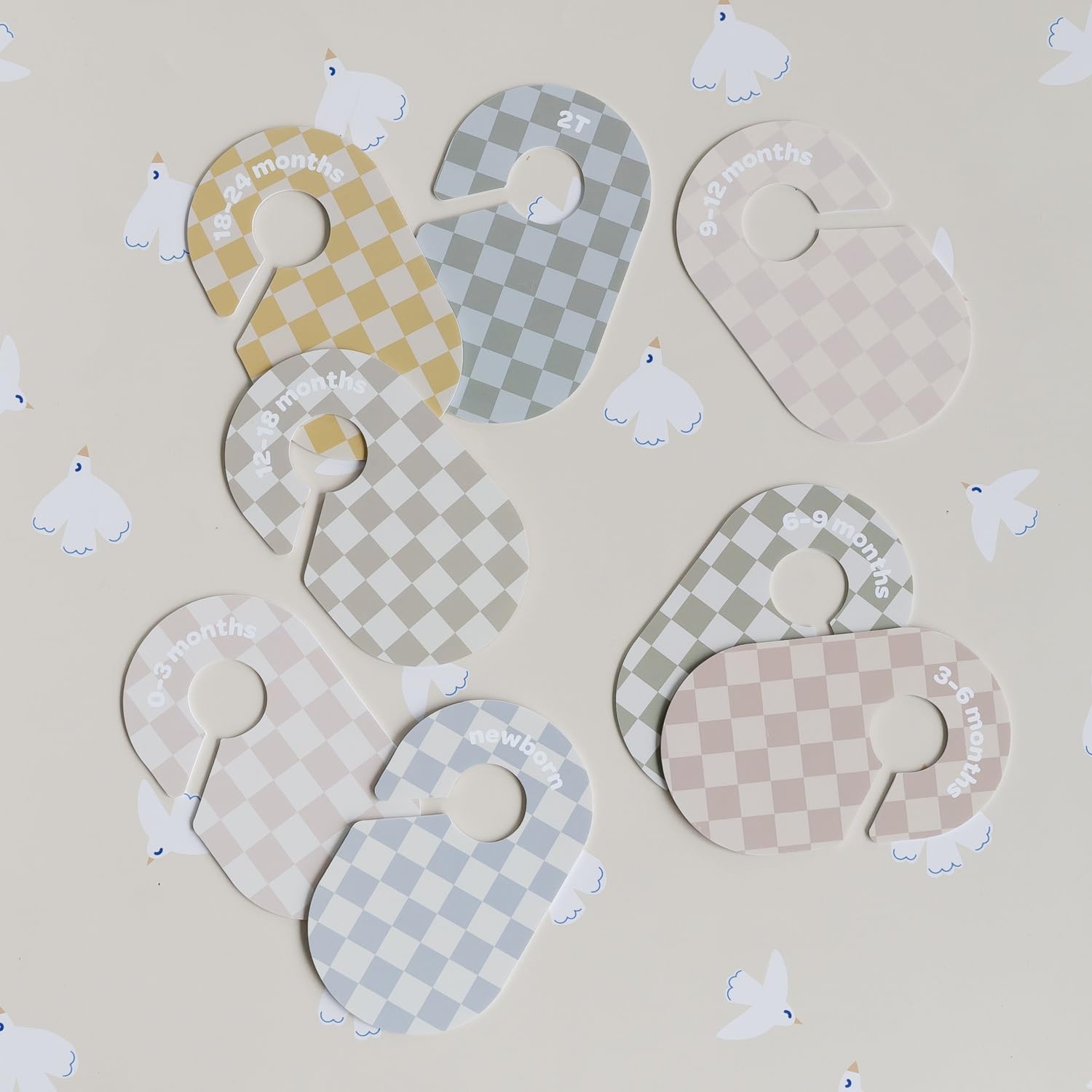 3 Sprouts baby closet dividers checkerboard style enhances closet organization and aesthetics.