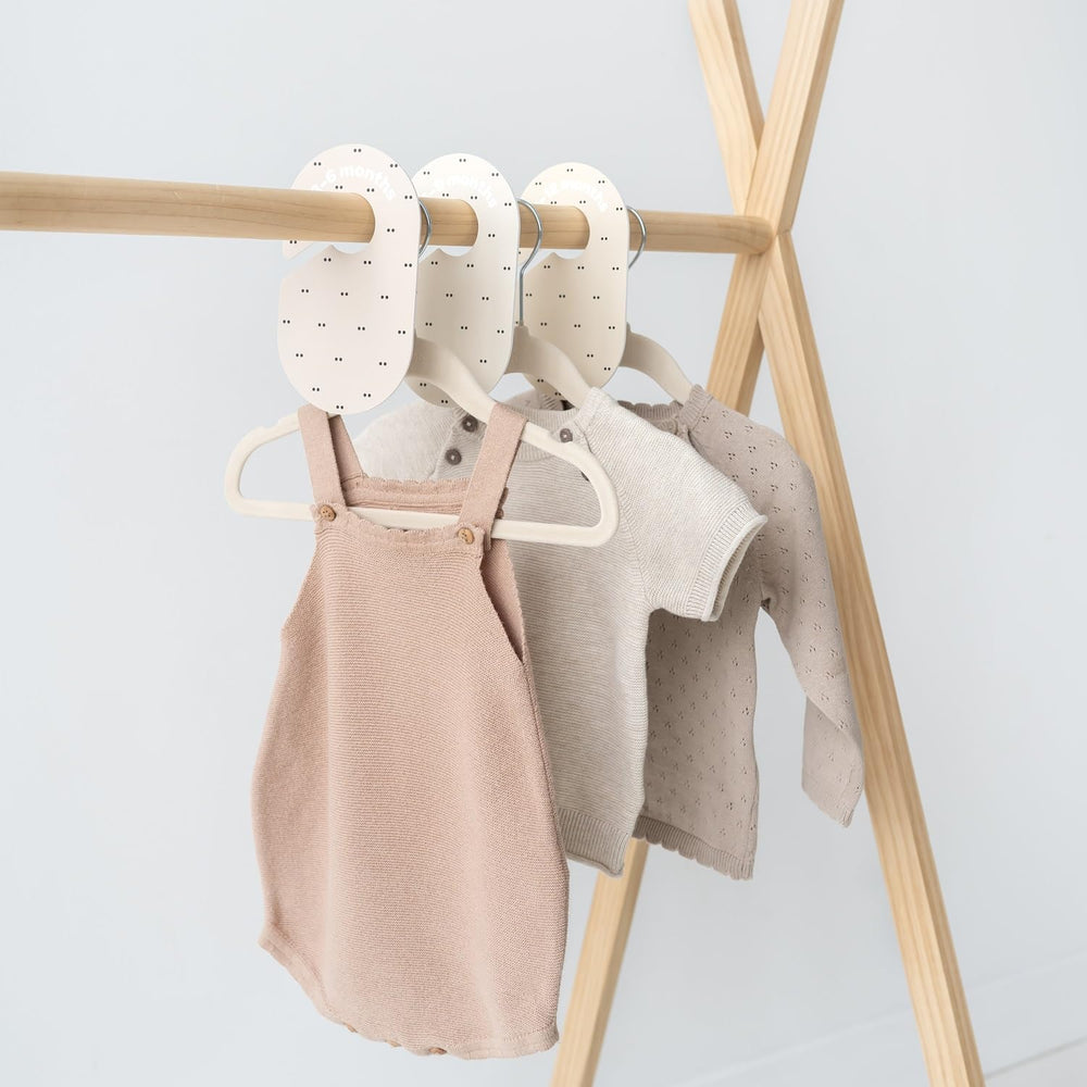 3 Sprouts closet dividers in-use setup demonstrates organized nursery closet.