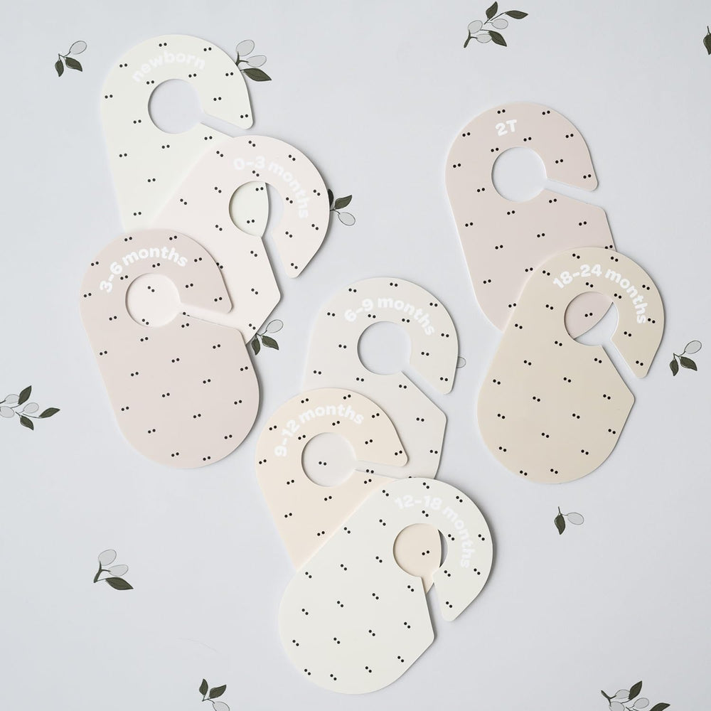 3 Sprouts closet dividers soft Nordic colors blend with nursery decor.