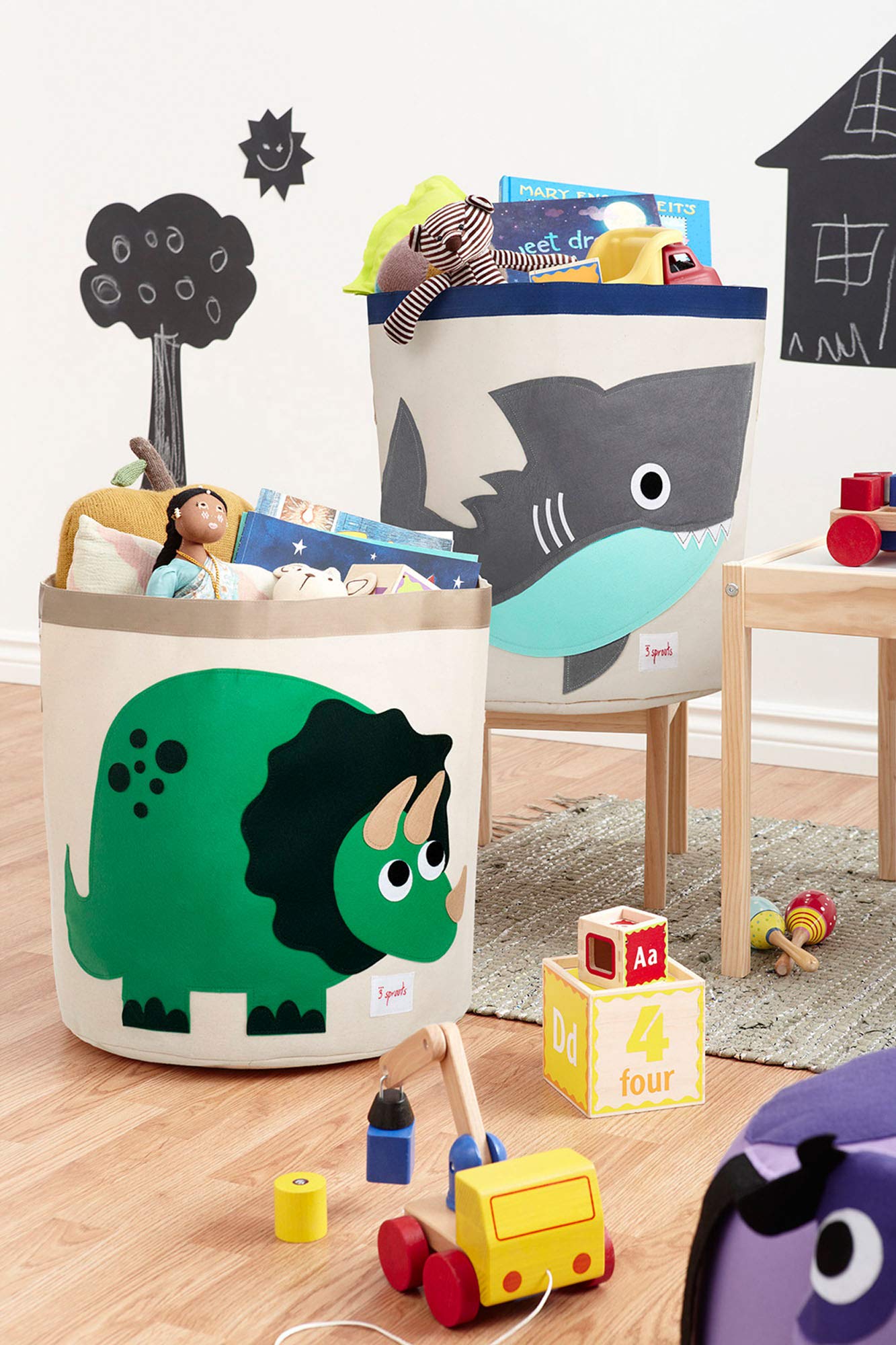 3 Sprouts cotton canvas storage basket in nursery for toys and blankets.