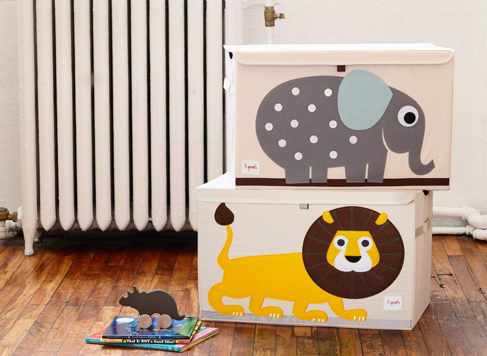 3 Sprouts lion toy chest collapsible design stores flat when not in use.