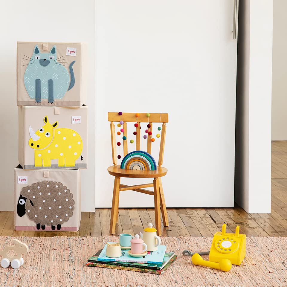 3 Sprouts toy storage cube filled with toys and books for quick cleanup.