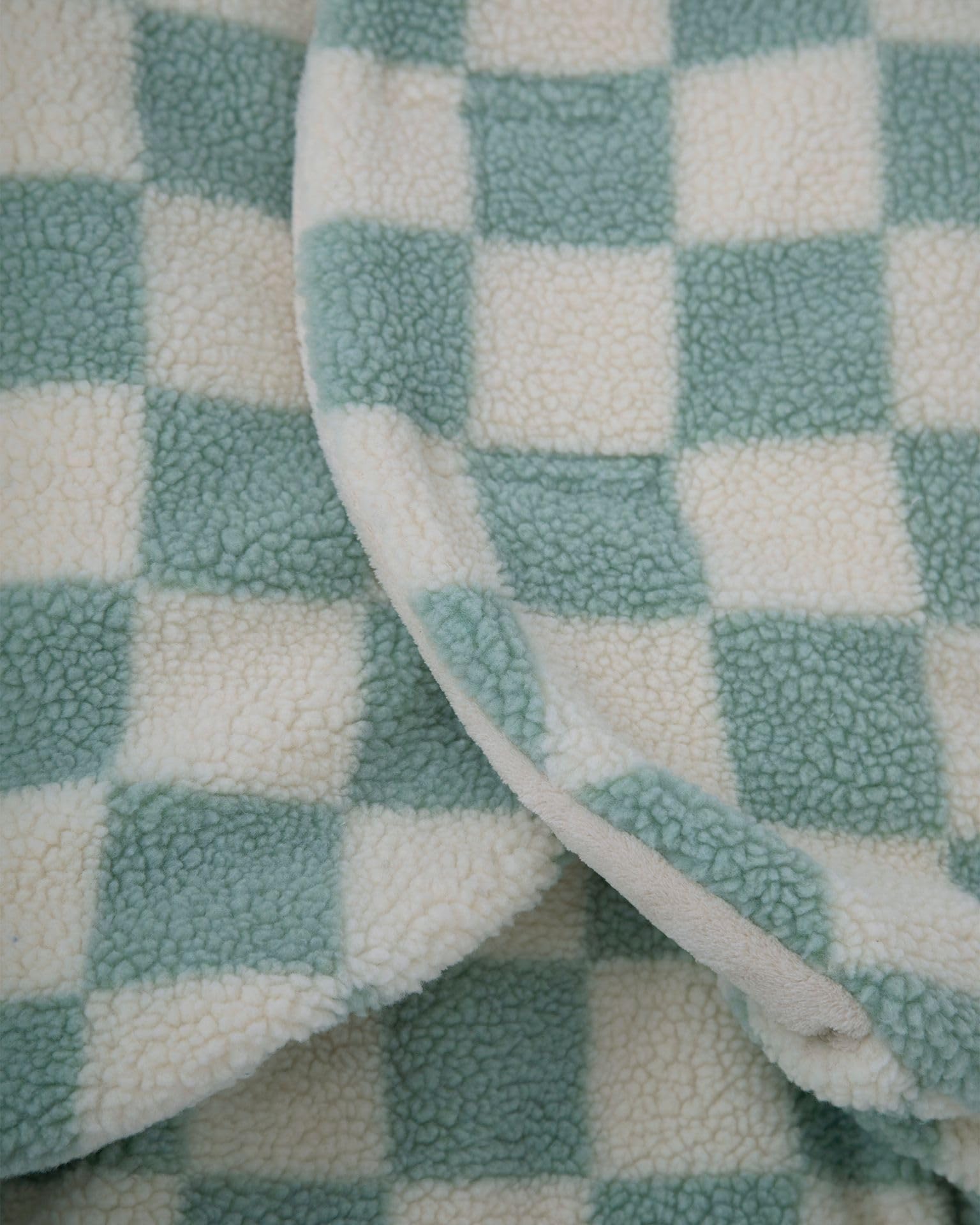 7AM blanket features adjustable leg muffs and contoured hood for growing babies.