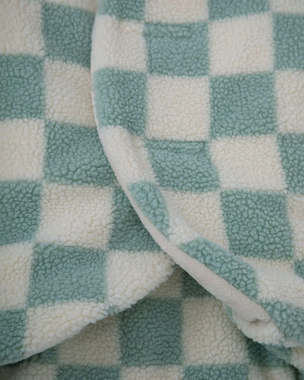 7AM blanket features adjustable leg muffs and contoured hood for growing babies.