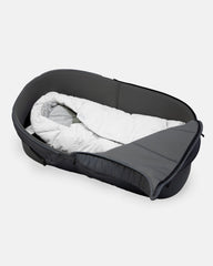 7 A.M. Enfant Nido cover shows stroller compatibility for easy travel.