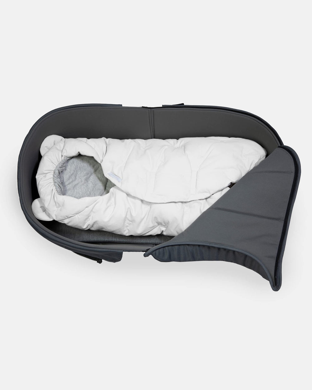 7 A.M. Enfant Nido Whisper White finish offers clean-styled car seat.