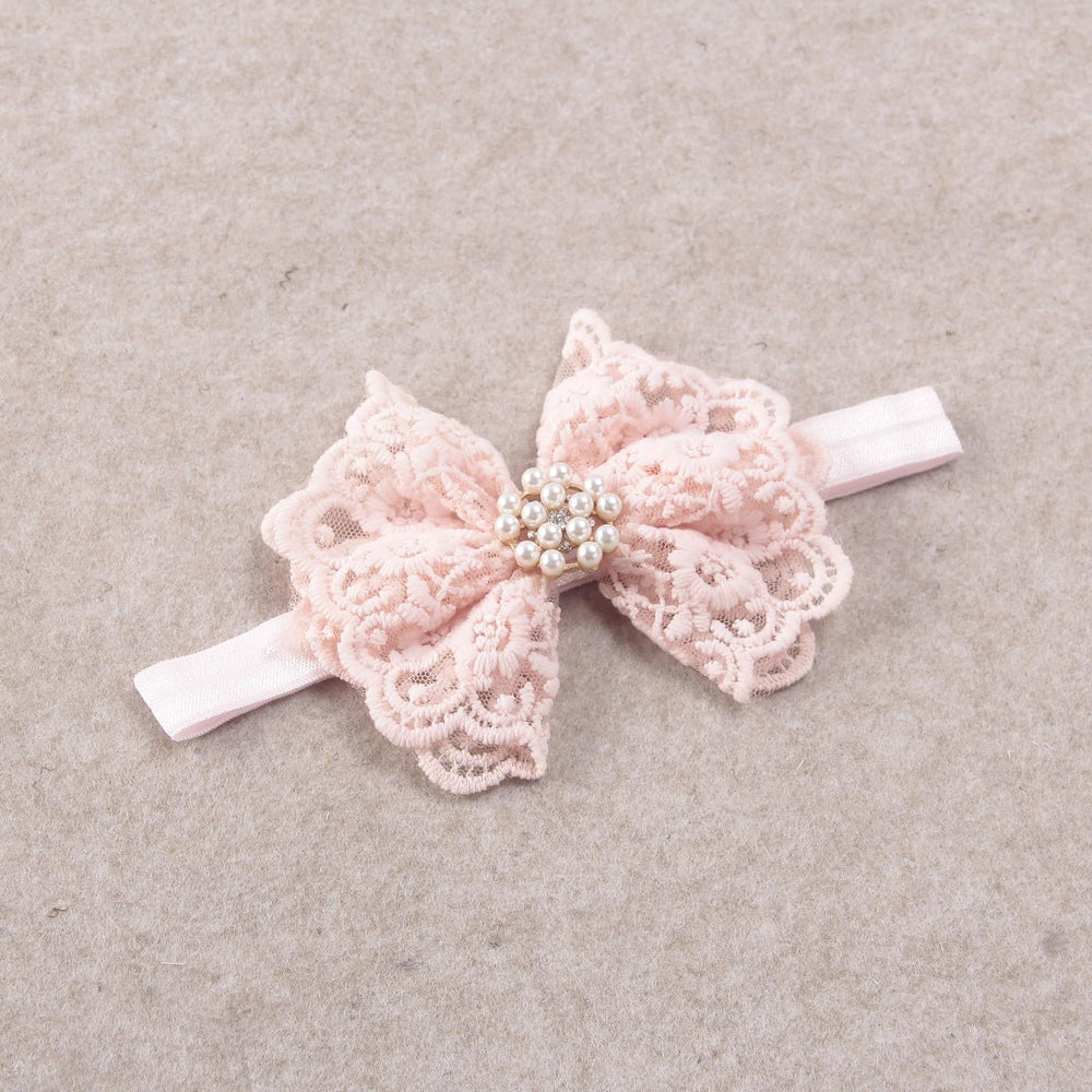 Nishine one-size-fits-most headband design on a baby