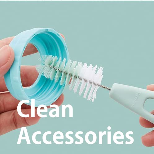 Simba Rotary Nipple Brush Pink cleaning bottles and caps efficiently.
