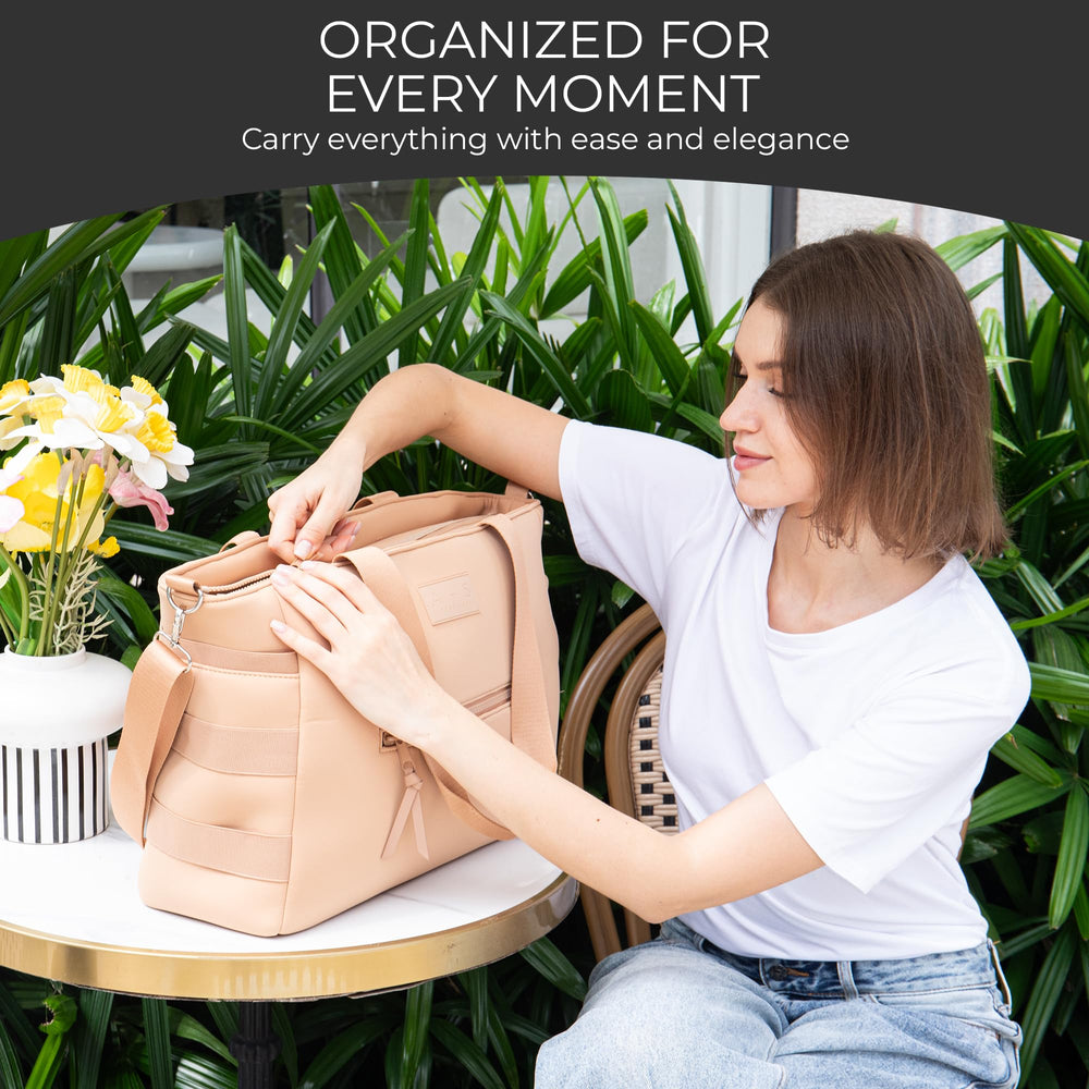 A + S Luxxe Baby Luxxe Diaper Tote foldable changing mat for on-the-go changes.