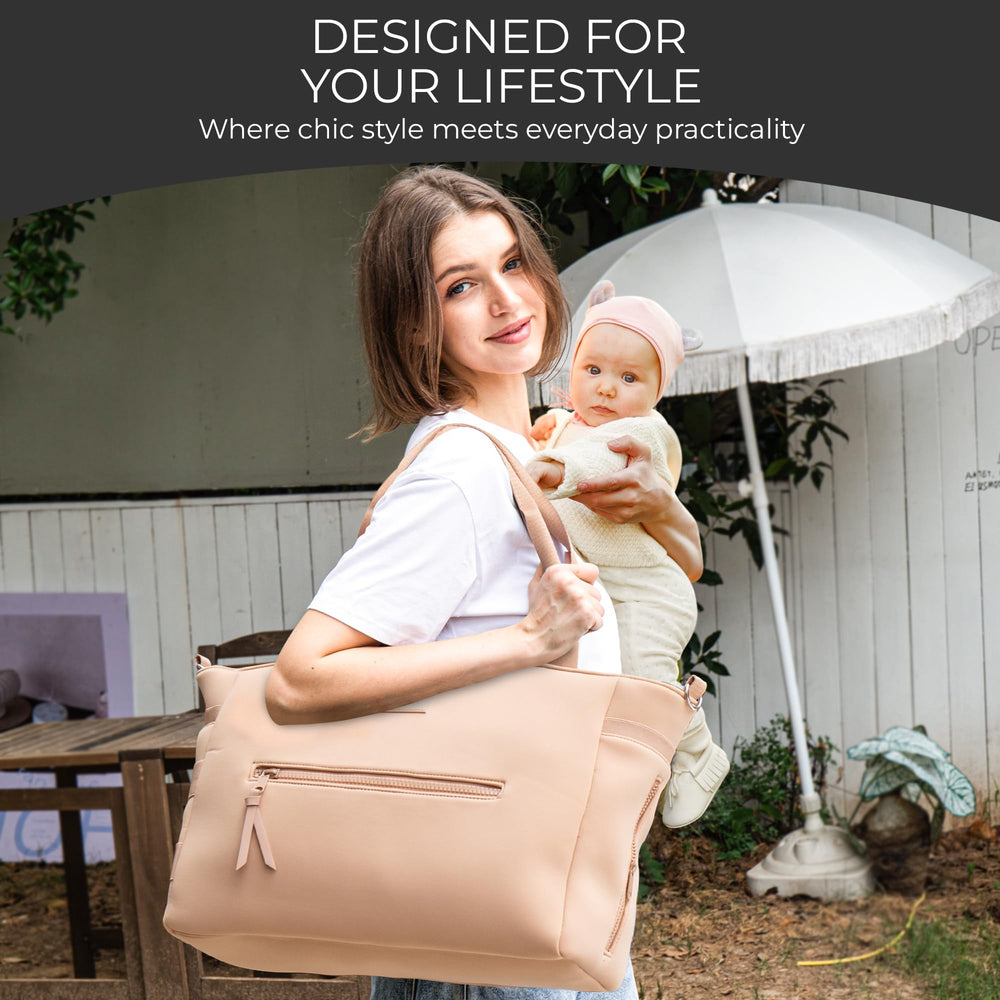 A + S Luxxe Baby Luxxe Diaper Tote gold hardware adds elevated style to everyday outings.