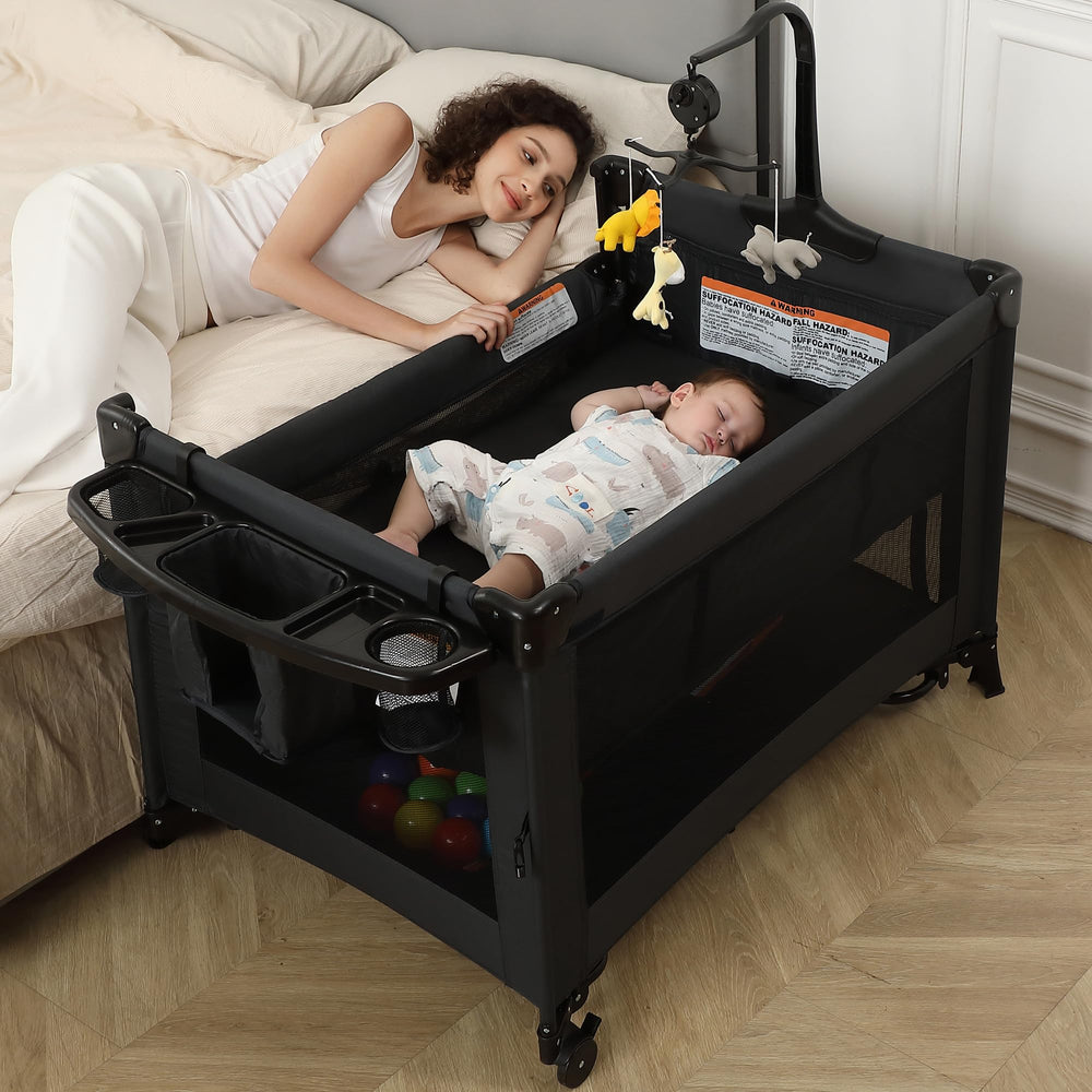 A2DAO black 5in1-changing-table shows convenient diaper changes beside the bed.