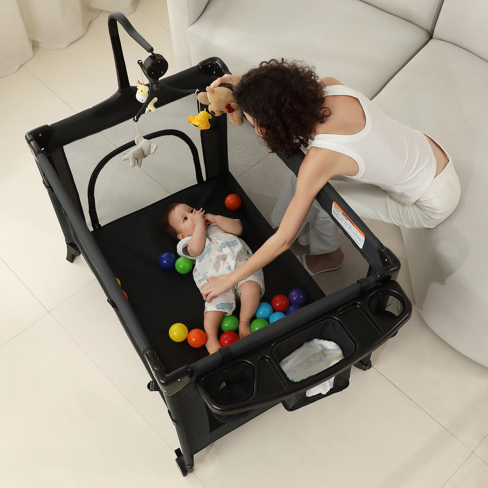 A2DAO black folding-travel-playard demonstrates portable setup for trips.