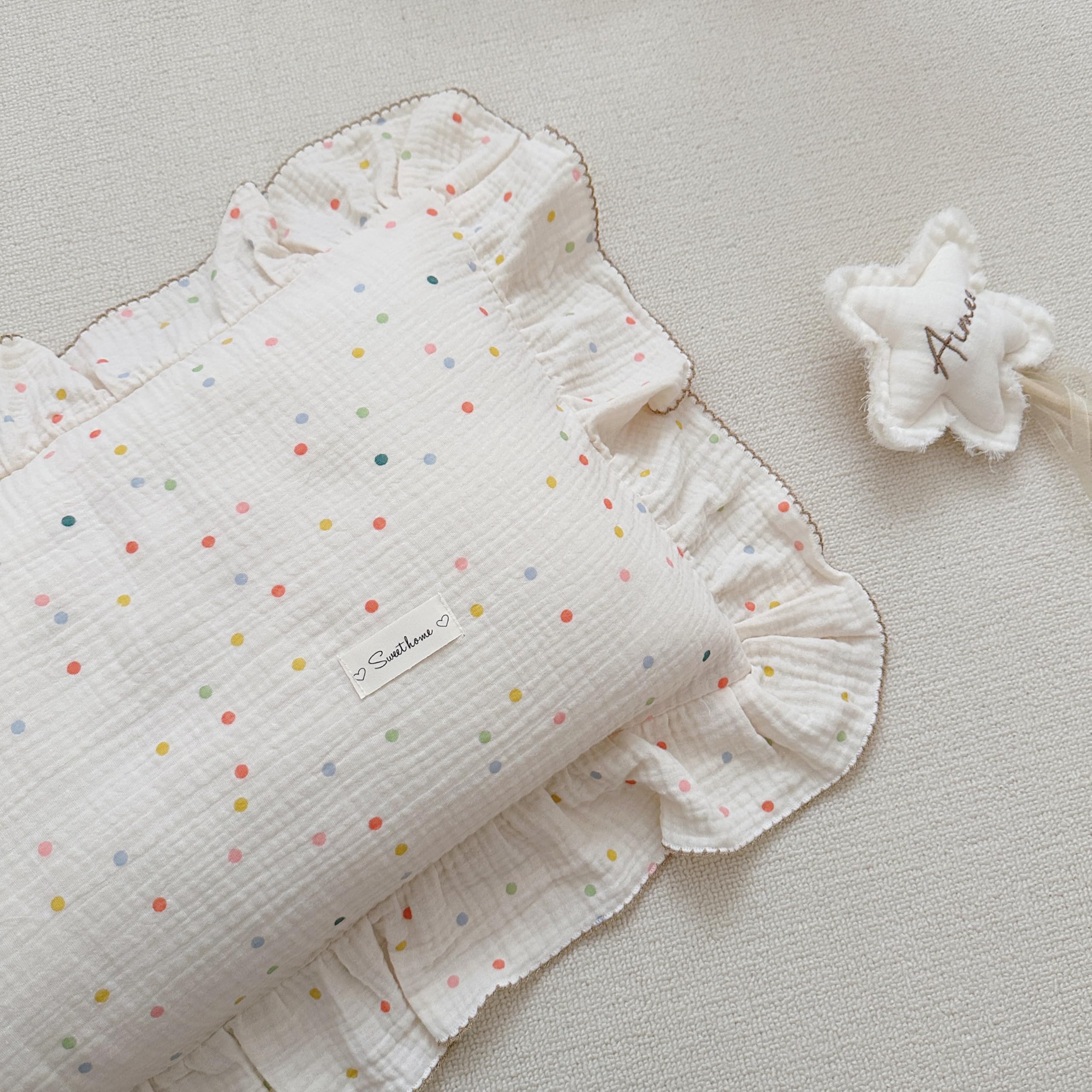 AOJIM pillowcase closeup shows ruffle edges for cute nursery styling