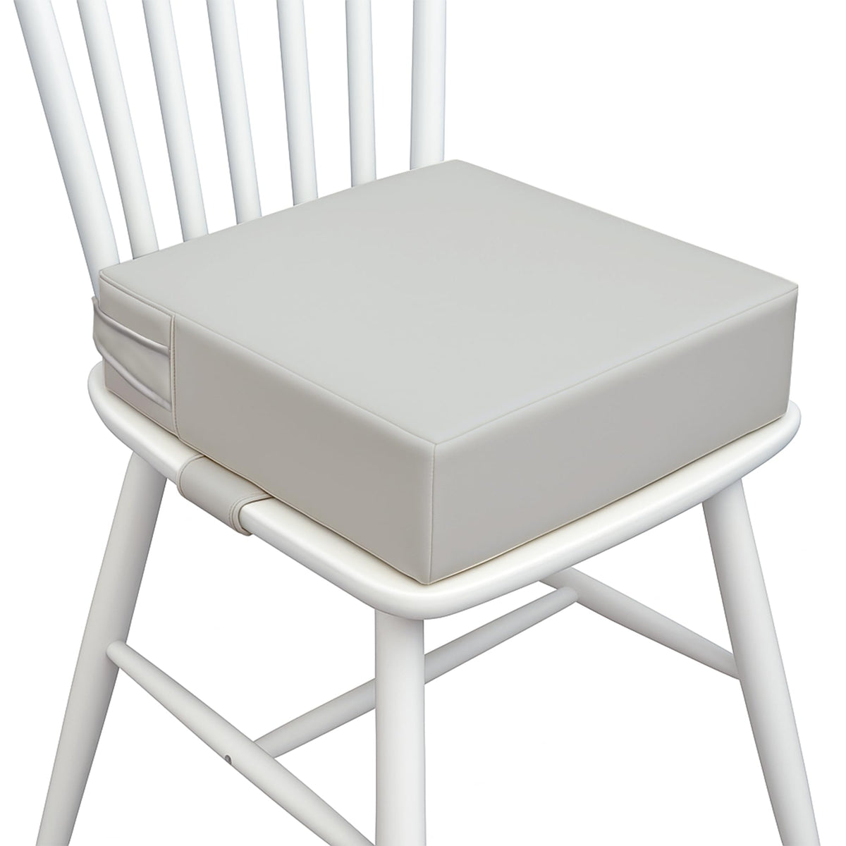 AAAini booster seat front view highlights secure straps for stable dining on the go.