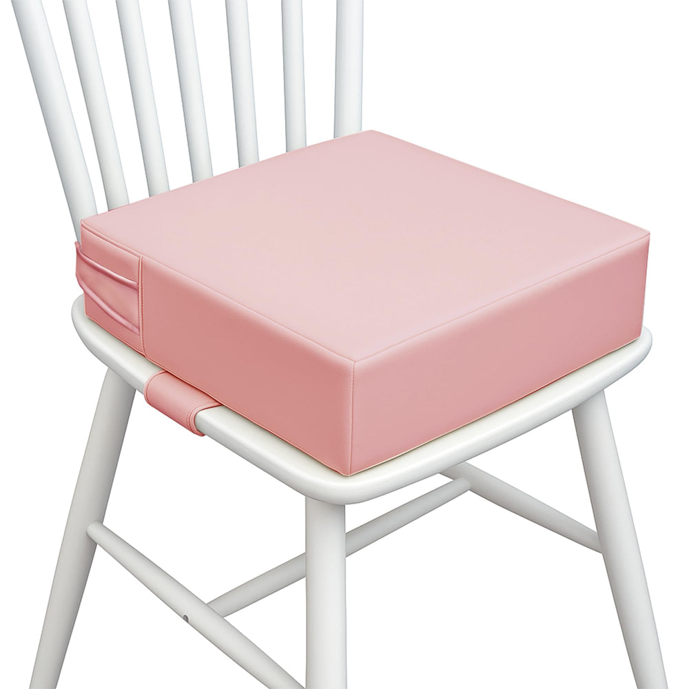 AAAini booster seat pink front view shows compact, portable toddler seating for meals.