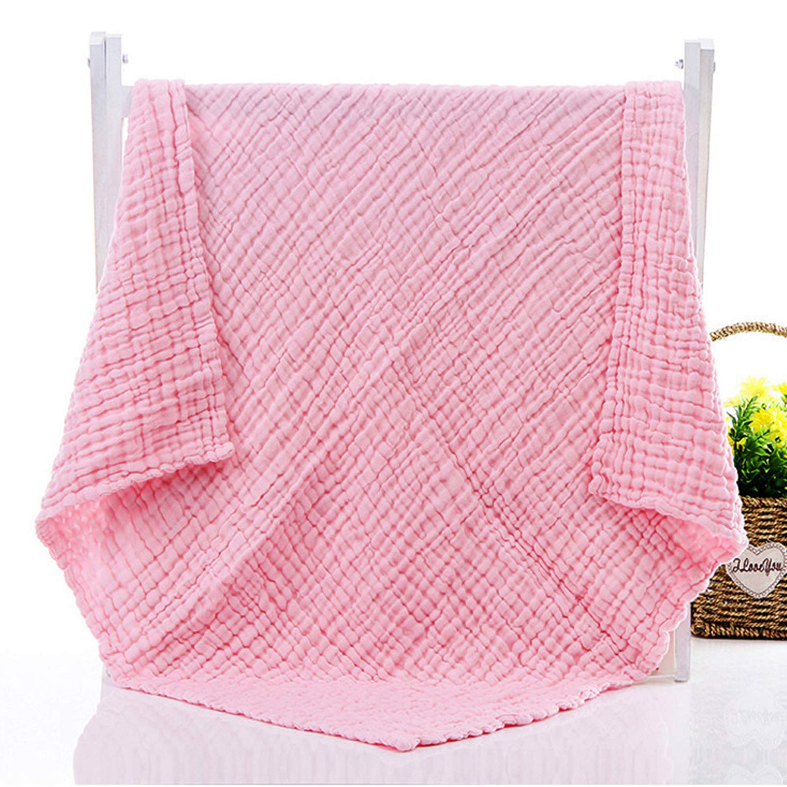 Aablexema muslin baby towel close-up shows honeycomb embossing for six-layer absorbency.