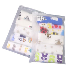 AALFA 5 Flower beige handkerchiefs on white background compact for on-the-go baby care