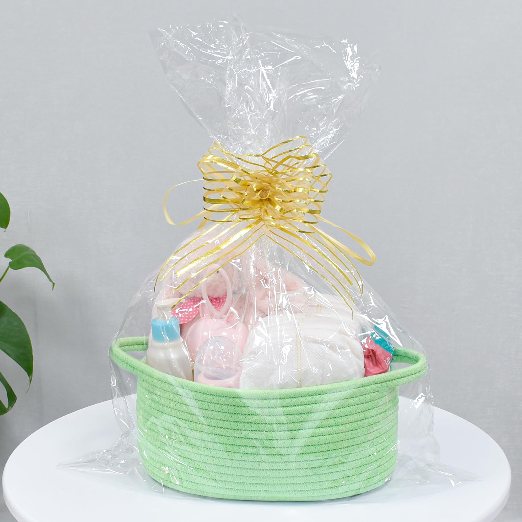 ABenkle baby-room organizer basket neatly holds toys or blankets.