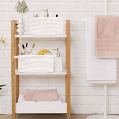 ABenkle basket in nursery decor adds minimalist storage.