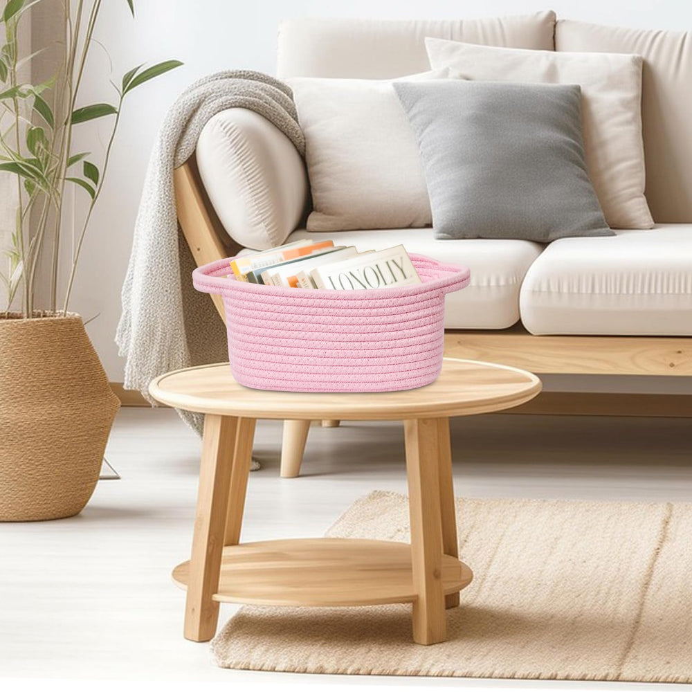 ABenkle pink basket on bathroom counter stores essentials with simple wipe-clean care