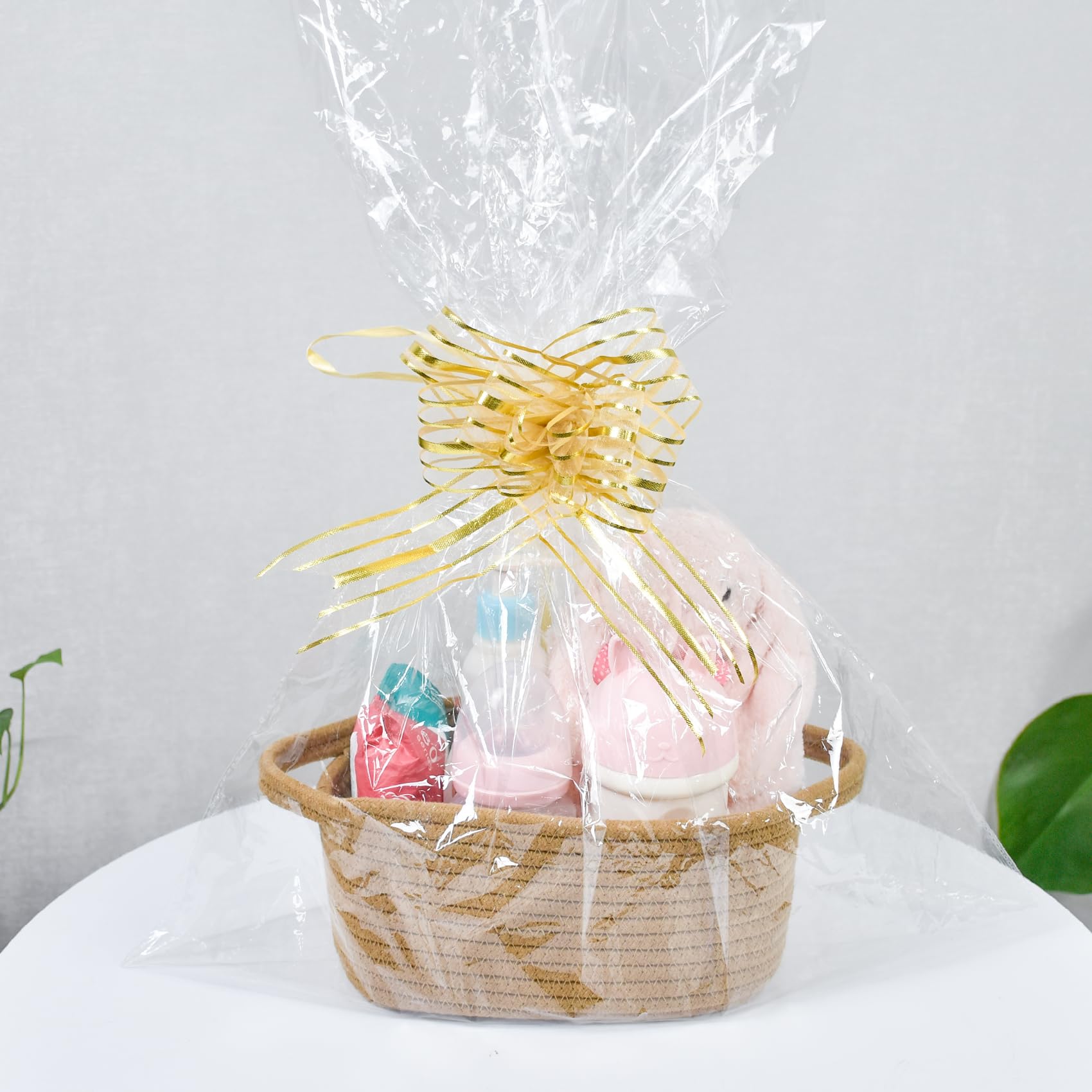 ABenkle bedside storage basket keeps essentials within reach.